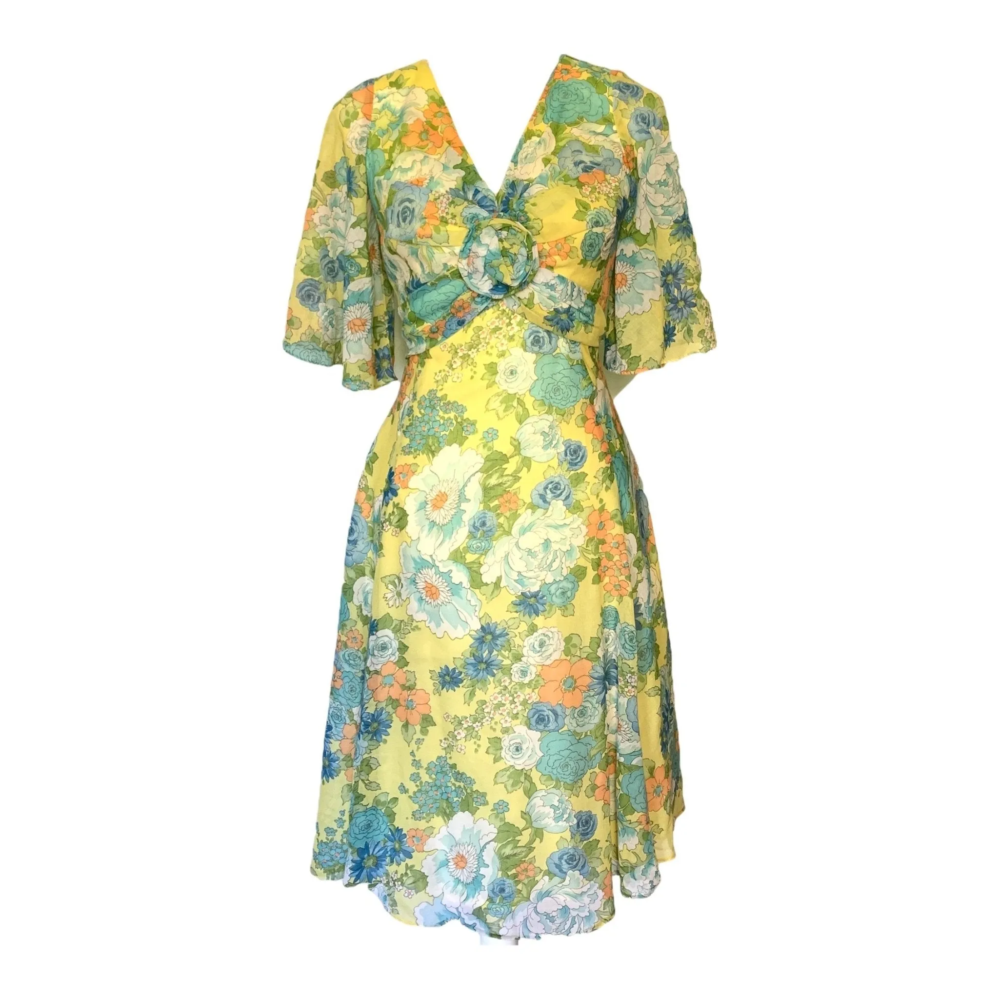 1960s Floral Summer Midi Dress by Miss Elliette with a Green, Blue and Yellow Floral Design.