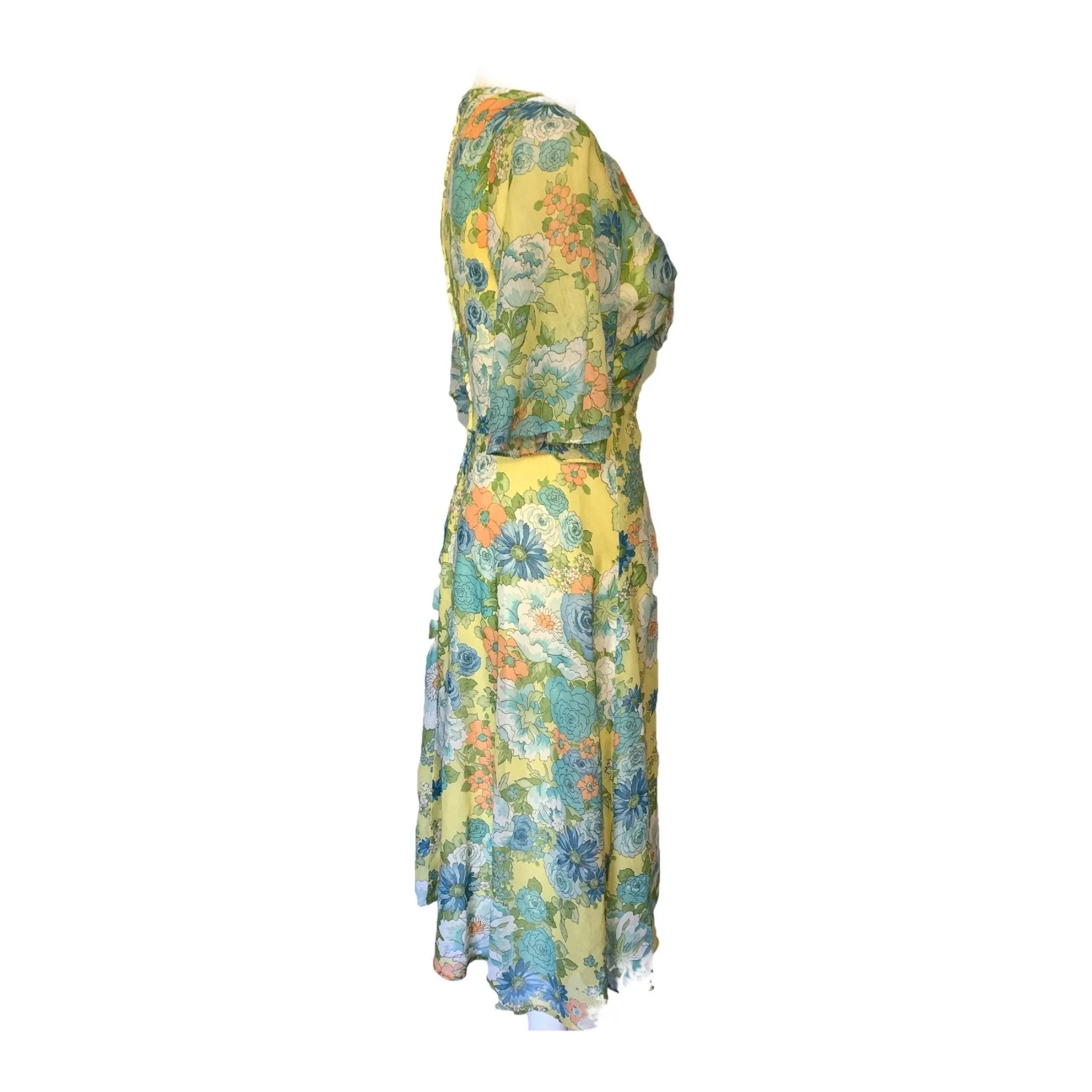 1960s Floral Summer Midi Dress by Miss Elliette with a Green, Blue and Yellow Floral Design.