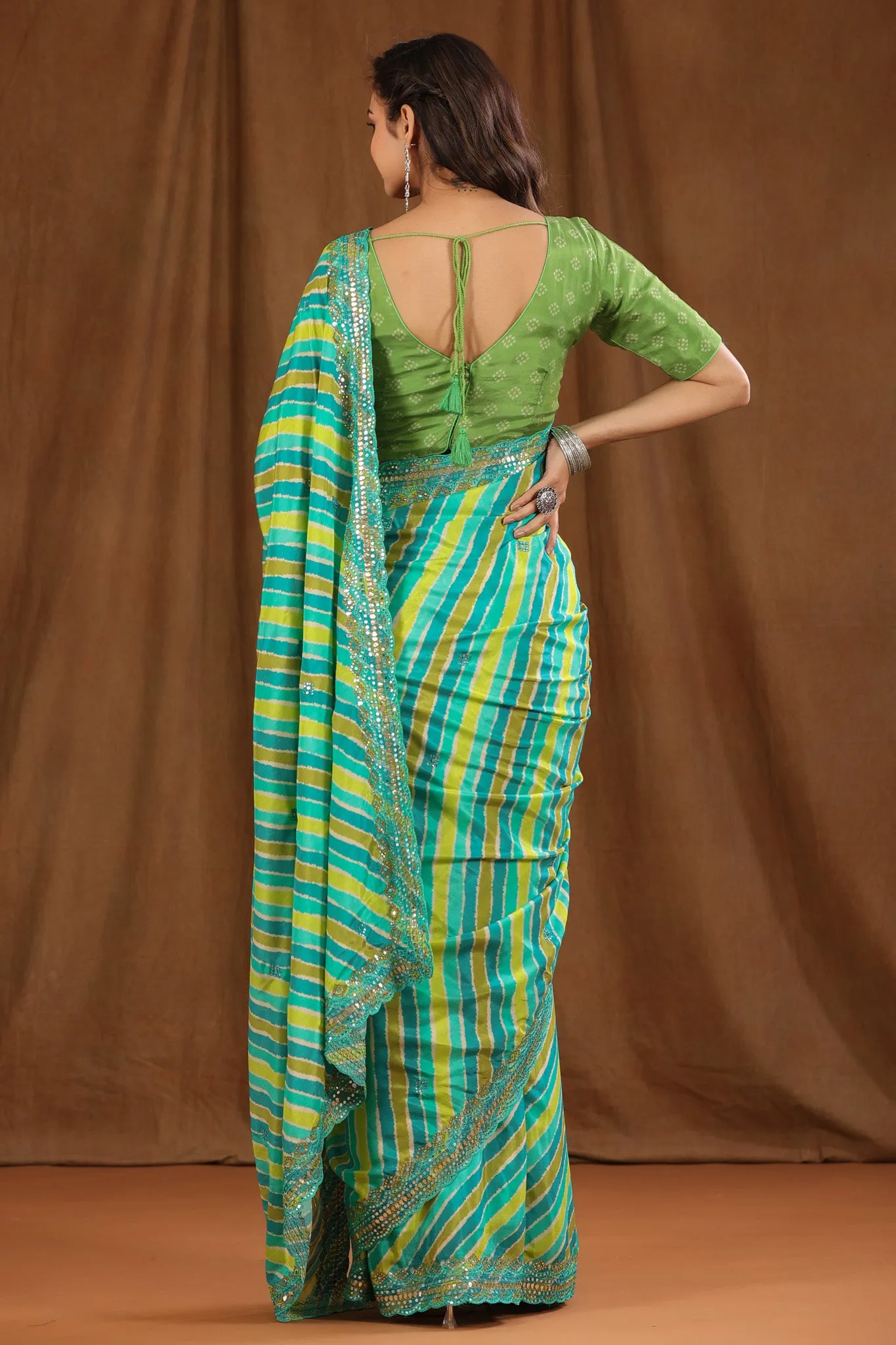 90Z782-NRO Green Stripes Crepe Saree with Scalloped Border