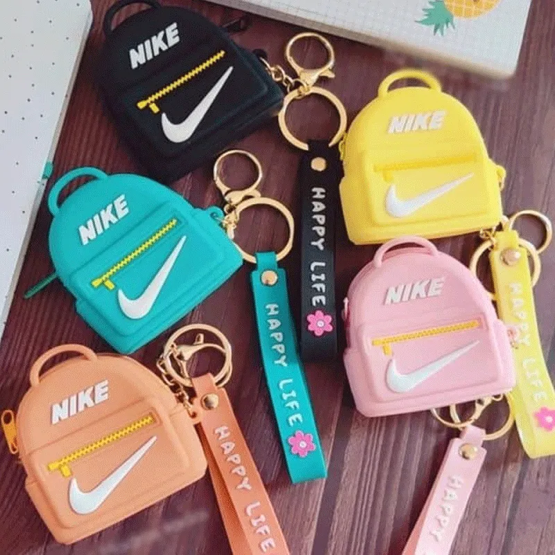 Clearance Sale: Adorable Kids Nike Style School Toy Plush Soft Rubber Money Wallet in Pakistan - Cute Fruit and Flower Coin Purses with Keychain